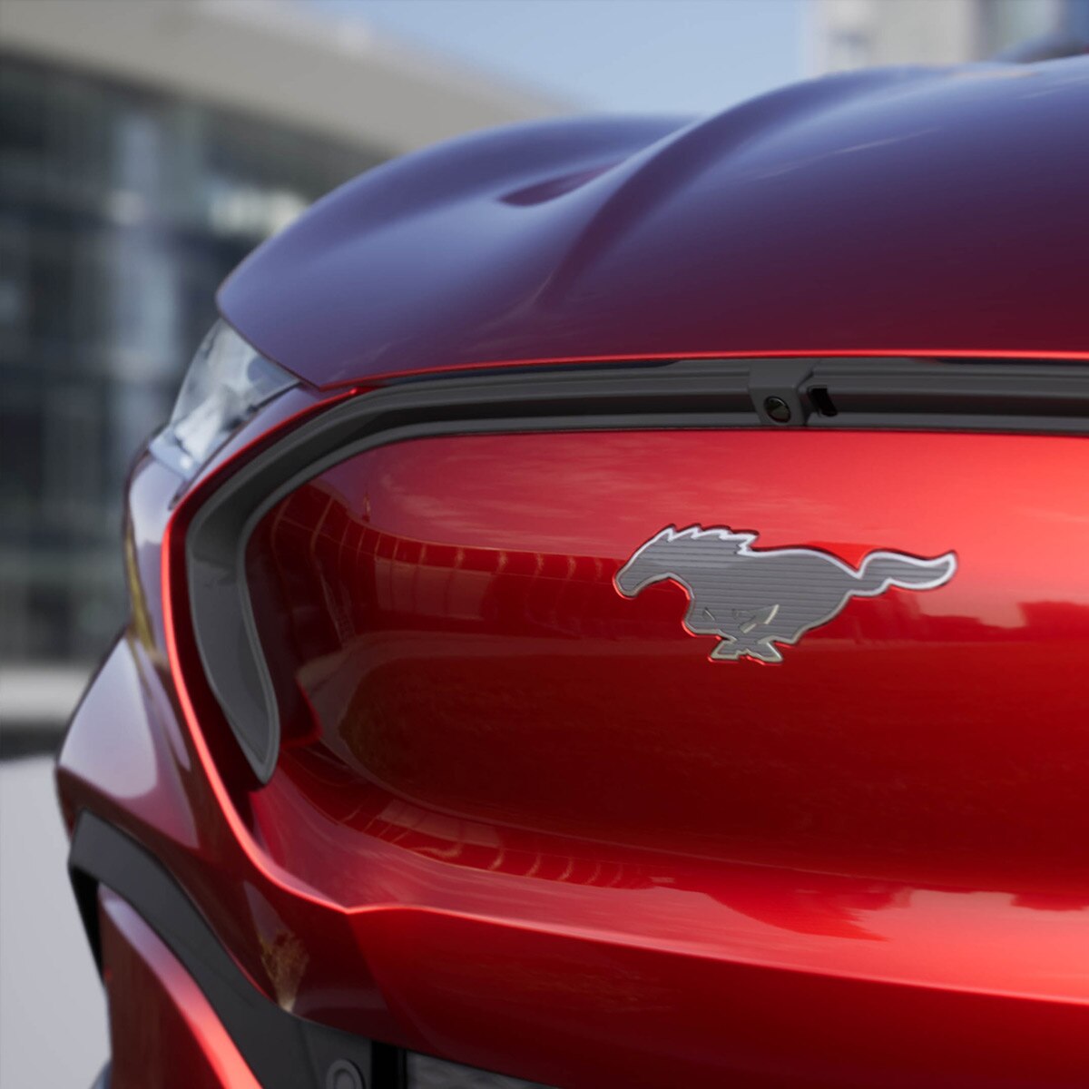 All-New Ford Mustang Mach-E AWD model close up on Pony badge