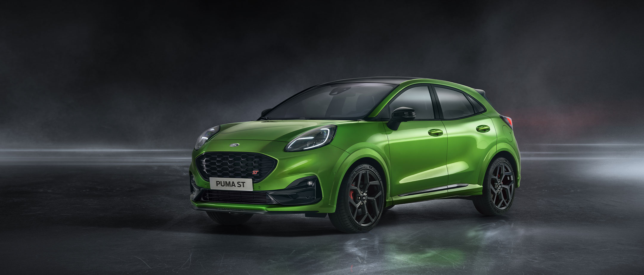 Green Ford Puma ST front view parked Green Ford Puma ST front view parked