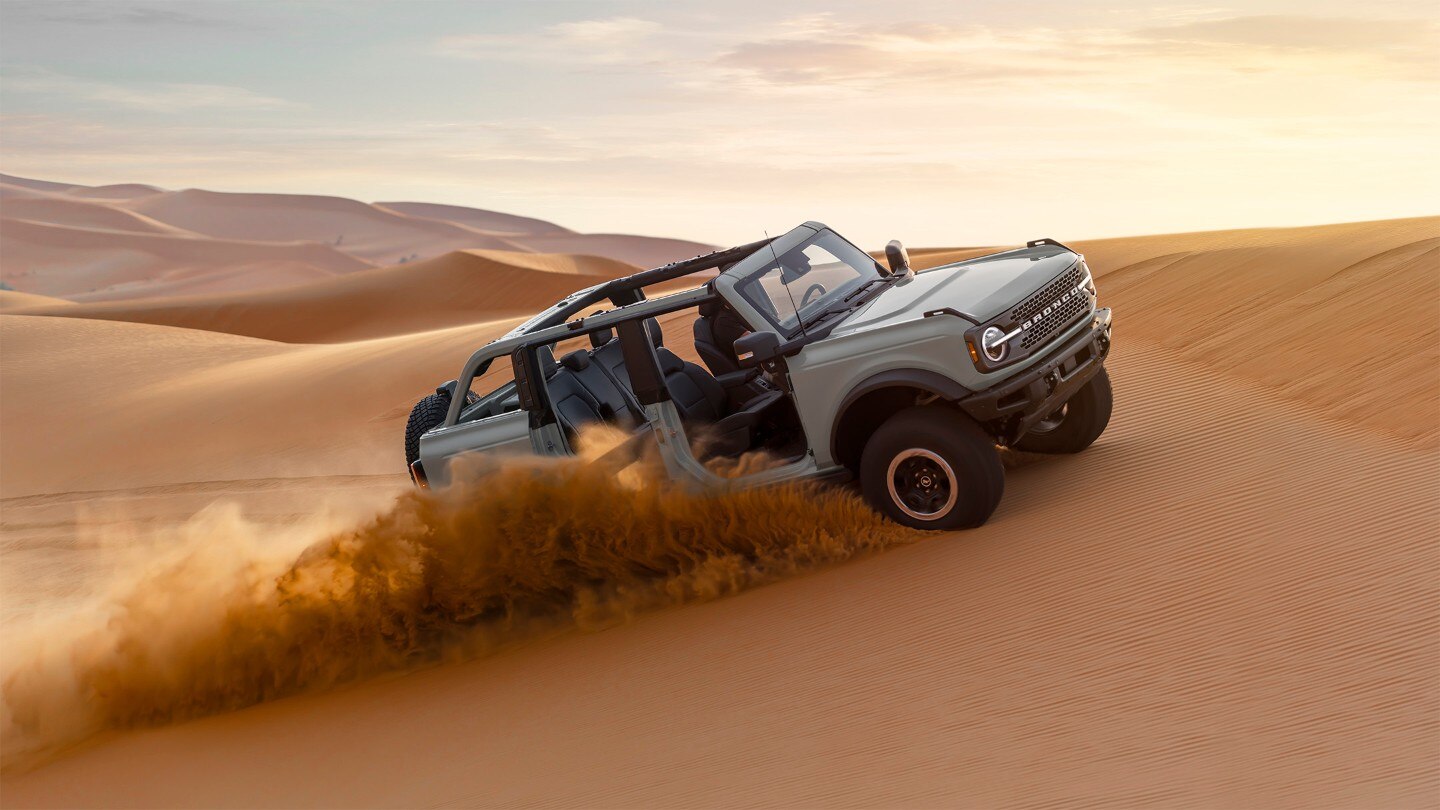 Ford Bronco driving in the desert