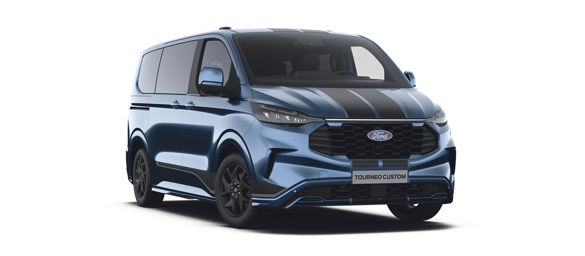 Egy kék Ford Tourneo Custom Sport fekete lökhárítócsíkkal.