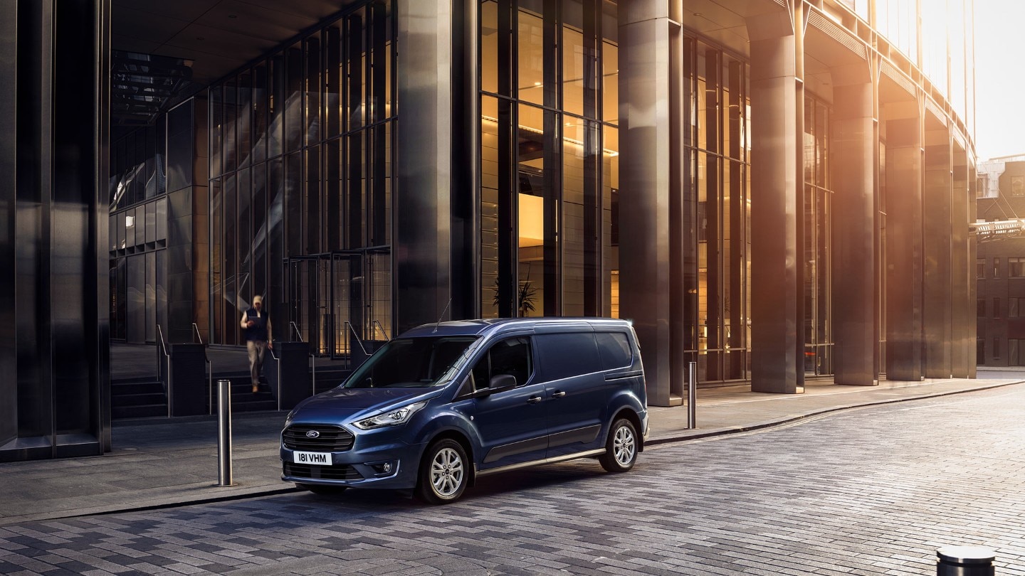 Blue Ford Transit Connect parked