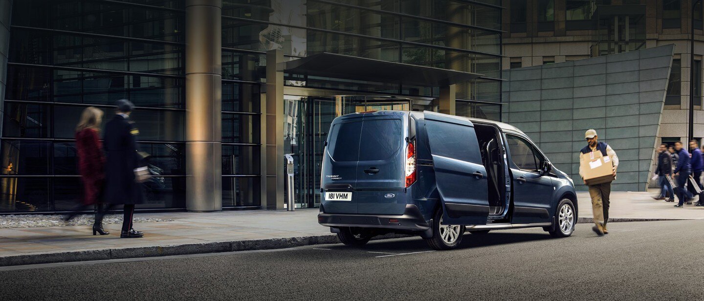 Blue Ford Transit Custom with side door