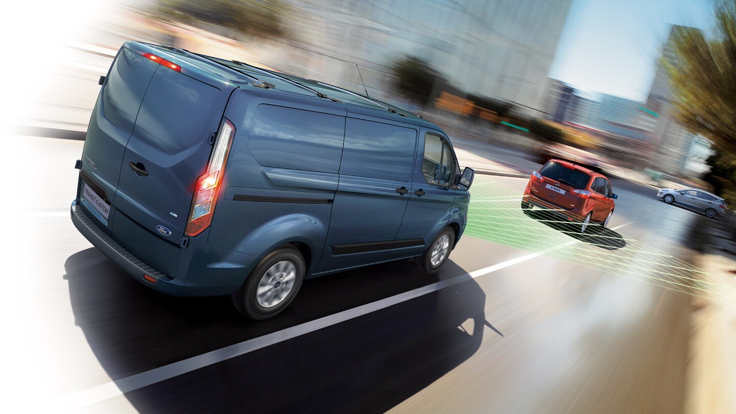 New Blue Ford Transit Custom scanning road