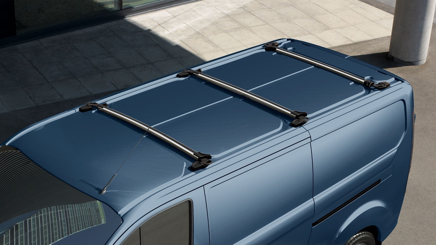 Blue Ford Transit Custom with roof rack