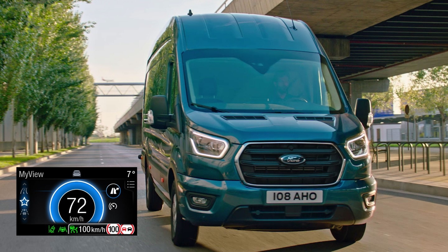 Ford Transit Minibus driving on motorway front view with Eco Mode dial in detail