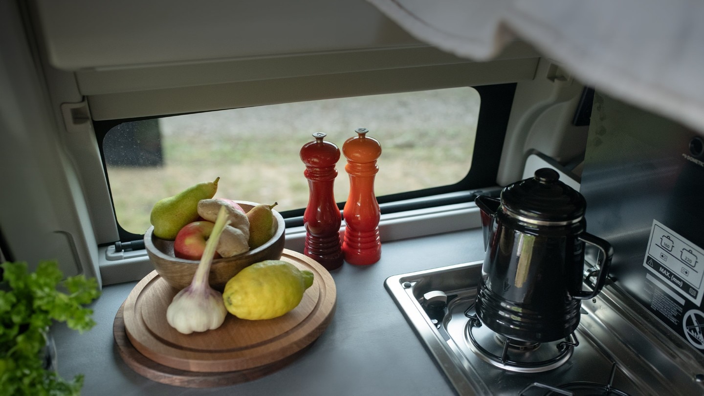 All-New Ford Transit Custom Nugget camper interior with kitchen board and fruit