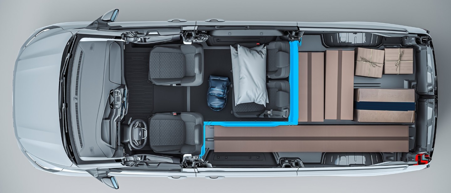 Aerial view looking down into a grey ford transit van multicab