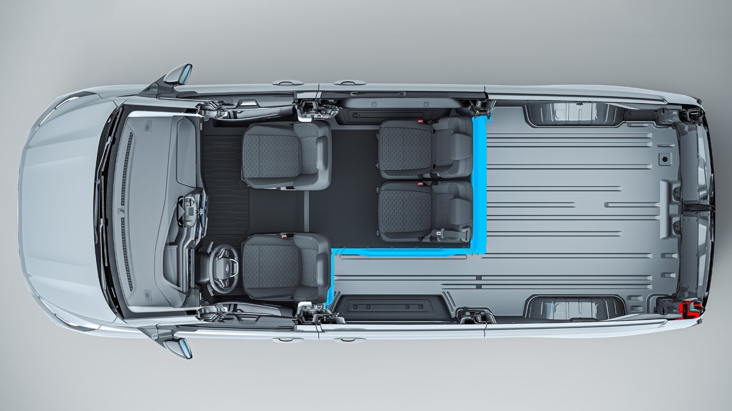 Aerial view looking down into a grey ford transit van multicab