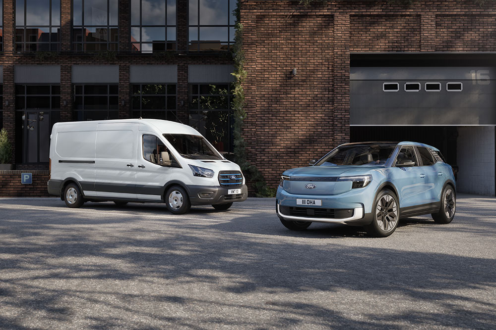 Two electric fleet vehicles: a white Ford E-Transit van and a blue all-electric Explorer.